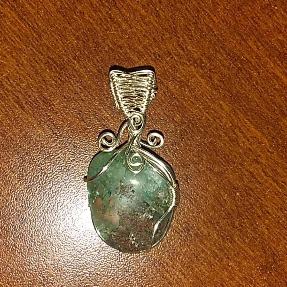Wire wrapped stone. Green quartz.